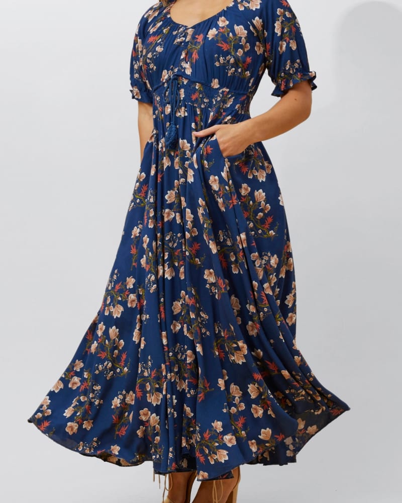 Front of a model wearing a size 1X Carla Maxi Dress Floral Puff Short Sleeves in Navy by ANNICK. | dia_product_style_image_id:349744